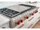 Professional-grade Wolf range with griddle and cooktop offers power and precision for culinary enthusiasts at 4585 Ryker Rd, Cumming, GA 30041