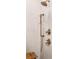 Detailed shower features include rainfall head, hand shower, bronze fixtures, and a convenient bench at 4585 Ryker Rd, Cumming, GA 30041
