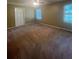 Bedroom with neutral walls, closet and lots of natural light at 1365 Rockmart Rd, Villa Rica, GA 30180