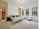 Bedroom with modern style, three windows, and access to the closet at 191 Darwish Dr, Mcdonough, GA 30252
