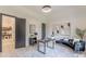 This office features light grey wood floors, neutral walls, dark trim, and modern decor at 191 Darwish Dr, Mcdonough, GA 30252