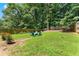 The large, fenced backyard offers ample space for outdoor activities at 2850 Winchester Dr, Cumming, GA 30041