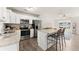 Well-appointed kitchen with granite countertops, stainless appliances, and seamless flow to the living area at 2850 Winchester Dr, Cumming, GA 30041