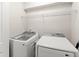 Bright laundry room featuring modern appliances and ample space at 2850 Winchester Dr, Cumming, GA 30041
