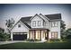 Beautiful two-story modern farmhouse with a black garage door and covered front porch at 4770 Wayt Farm Overlook, Cumming, GA 30040
