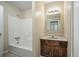 Bathroom featuring a shower-tub combination and a classic vanity at 5426 Martins Crossing Rd, Stone Mountain, GA 30088