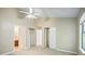 Bedroom with carpet, ceiling fan, and closet space at 5426 Martins Crossing Rd, Stone Mountain, GA 30088