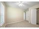 Bedroom with carpet flooring and closet at 5426 Martins Crossing Rd, Stone Mountain, GA 30088