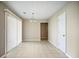 Spacious dining room boasting tile flooring, light walls and natural light at 5426 Martins Crossing Rd, Stone Mountain, GA 30088