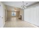 Open-concept living room featuring a fireplace and ample natural light at 5426 Martins Crossing Rd, Stone Mountain, GA 30088