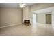 Bright living room featuring a fireplace and sliding glass doors at 5426 Martins Crossing Rd, Stone Mountain, GA 30088