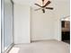This bedroom has carpeted floors, and a ceiling fan. An open door looks into the bathroom at 1080 Peachtree Ne St # 804, Atlanta, GA 30309