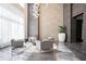 Stylish lobby area with modern seating, unique light fixture, and contemporary design at 1080 Peachtree Ne St # 804, Atlanta, GA 30309