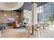 Inviting lounge with modern decor, cozy seating, billiard table, and floor to ceiling windows at 1080 Peachtree Ne St # 804, Atlanta, GA 30309