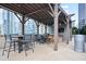 Outdoor kitchen featuring a grill, a counter and bar stool seating with a city view at 1080 Peachtree Ne St # 804, Atlanta, GA 30309