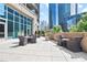 Charming outdoor patio with comfortable seating, lush landscaping, and stunning city views at 1080 Peachtree Ne St # 804, Atlanta, GA 30309