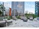 Stylish outdoor patio with comfortable seating, contemporary decor, and cityscape views at 1080 Peachtree Ne St # 804, Atlanta, GA 30309