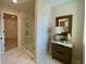 Bathroom featuring a glass door shower, modern vanity, and bright lighting at 120 Winsome Way, Woodstock, GA 30188