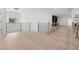 Upstairs hallway with horizontal railing and light hardwood floors at 4292 Sardis Church Rd, Buford, GA 30519