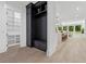 Spacious hallway features a built-in mudroom unit and access to the pantry and kitchen at 4292 Sardis Church Rd, Buford, GA 30519