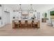 Bright, open kitchen boasts a large island, pendant lighting, and plenty of storage at 4292 Sardis Church Rd, Buford, GA 30519