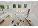 Open concept living room with tall windows and a view of dining area and kitchen at 4292 Sardis Church Rd, Buford, GA 30519