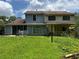 A view of the home's backyard featuring a grill and patio at 8170 Canyon Forge Dr, Riverdale, GA 30274