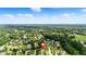 Neighborhood aerial view surrounded by lush green landscape and mature trees at 150 Crestworth Xing, Powder Springs, GA 30127