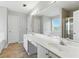 Bright primary bathroom with dual sinks, soaking tub, and walk-in shower at 150 Crestworth Xing, Powder Springs, GA 30127
