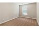 Bright, carpeted bedroom with a window at 150 Crestworth Xing, Powder Springs, GA 30127