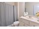 Bathroom featuring a shower, vanity and toilet at 297 Aylesbury Blvd, Mcdonough, GA 30252