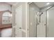 Cozy bathroom featuring walk-in shower with glass doors at 3707 Vineyards Lake Nw Cir # 22, Kennesaw, GA 30144