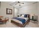 Bedroom with a rustic bed frame, accent chair and natural light at 1598 Aldworth Se Pl, Marietta, GA 30339
