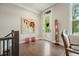 Bright foyer with decorative art and chair at 1598 Aldworth Se Pl, Marietta, GA 30339