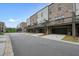 Charming townhome community boasting private garages and well-maintained streetscape at 1598 Aldworth Se Pl, Marietta, GA 30339