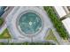 Aerial view of water fountain and surrounding city streets and modern buildings at 1598 Aldworth Se Pl, Marietta, GA 30339