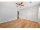 Empty bedroom with ceiling fan, wood floors, and ample closet space at 1895 Flat Shoals Se Rd, Atlanta, GA 30316