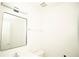 Powder room featuring an updated mirror, vanity, faucet and light fixture at 2504 Hannah Haven Dr, Conyers, GA 30012
