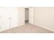 Bedroom with large closet with double doors and a view into hallway at 2504 Hannah Haven Dr, Conyers, GA 30012
