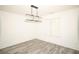 Bright dining room with chandelier and stylish wood-look floors at 2504 Hannah Haven Dr, Conyers, GA 30012