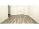 Bright room with wood-look floors and large bay window at 2504 Hannah Haven Dr, Conyers, GA 30012