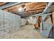 An unfinished basement showing exposed ductwork, a concrete floor, and cinder block wall at 8587 Cumming Se Hwy, Canton, GA 30115