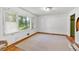Bedroom featuring hardwood floors, natural lighting, and an airy feel at 8587 Cumming Se Hwy, Canton, GA 30115