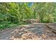 Home and front yard, ample parking and mature trees at 8587 Cumming Se Hwy, Canton, GA 30115
