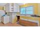 Bright kitchen featuring natural light and awaiting a modern redesign at 8587 Cumming Se Hwy, Canton, GA 30115