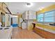 Bright kitchen featuring natural light and awaiting a modern redesign at 8587 Cumming Se Hwy, Canton, GA 30115
