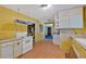 Kitchen with an adjacent eating area, ready for a complete renovation and upgrade at 8587 Cumming Se Hwy, Canton, GA 30115