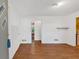 Bright living room featuring hardwood floors and natural light, ready for your personal touch at 8587 Cumming Se Hwy, Canton, GA 30115
