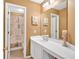 Bathroom features a single sink vanity and a shower-tub combo at 1331 Red Hill Rd, Marietta, GA 30008