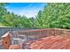 Exterior deck with chairs and natural wooded scenery at 1331 Red Hill Rd, Marietta, GA 30008